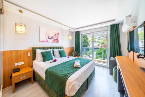 Imagen de la habitación del Exclusive Mogons Hotel. Foto 18