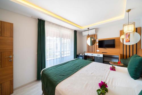 Imagen de la habitación del Exclusive Mogons Hotel. Foto 19
