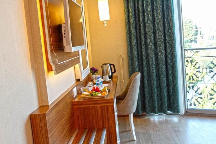 Imagen de la habitación del Exelans Hotel. Foto 17