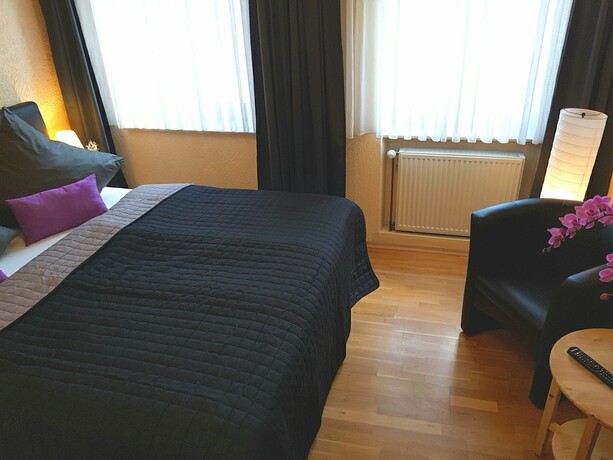 Imagen de la habitación del Exquisite. Foto 16