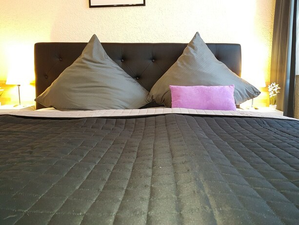 Imagen de la habitación del Exquisite. Foto 20