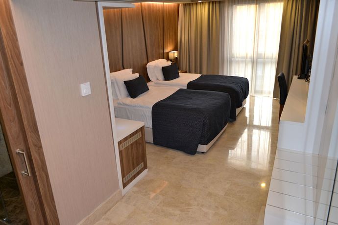 Imagen de la habitación del Extenso Hotel. Foto 17