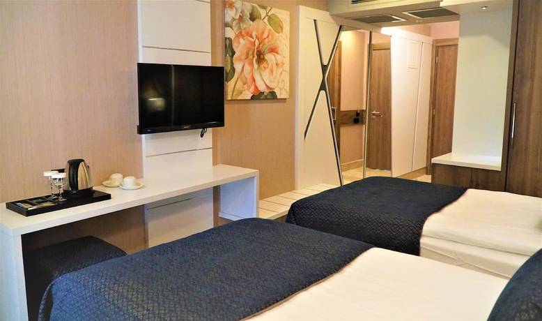 Imagen de la habitación del Extenso Hotel. Foto 18