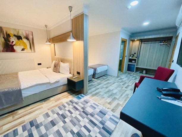 Imagen de la habitación del FOCUS PARK SUİT HOTEL. Foto 8