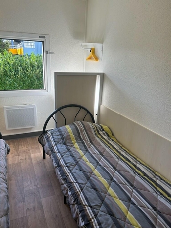 Imagen de la habitación del FYL hôtel Saint Pol. Foto 7