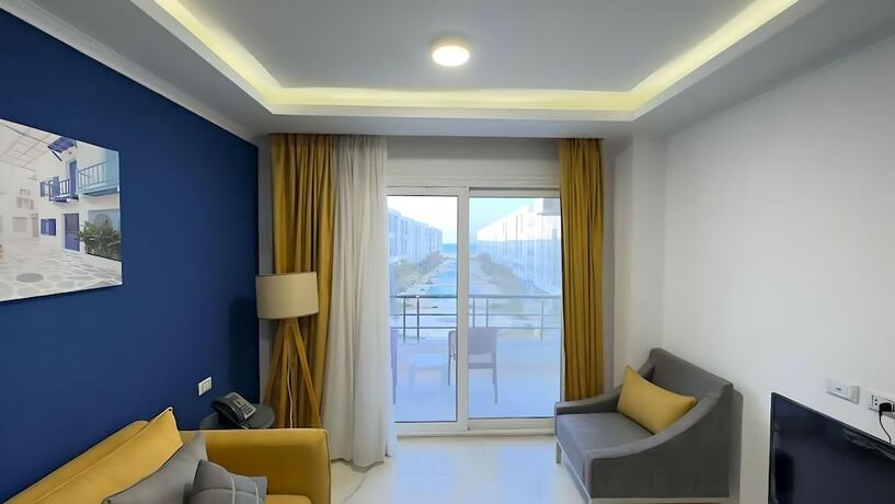 Imagen de la habitación del Fanadir Bay Suitesandbeach Resort. Foto 19