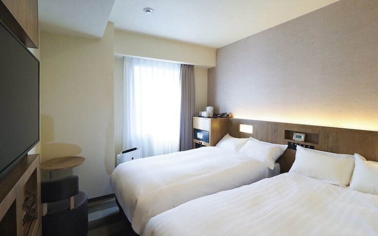 Imagen de la habitación del Far East Village Hotel Yokohama. Foto 17