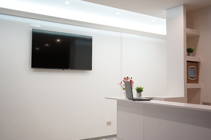 Imagen de los interiores del Farina Rooms and Apartments. Foto 14