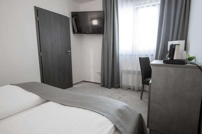 Imagen de la habitación del Fast Lane Hotel. Foto 7