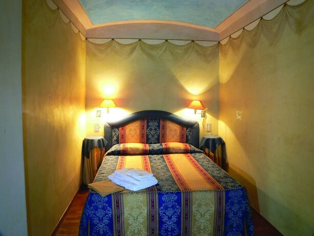 Imagen de la habitación del Fattoria La Gigliola. Foto 12