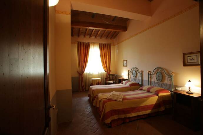 Imagen de la habitación del Fattoria La Gigliola. Foto 13