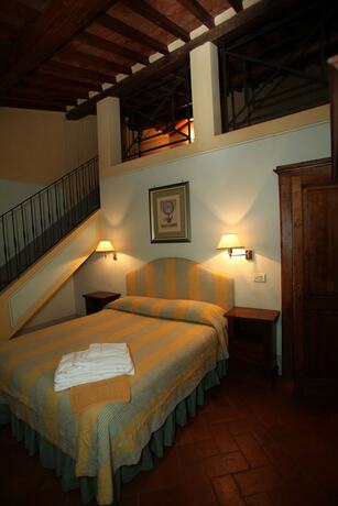 Imagen de la habitación del Fattoria La Gigliola. Foto 15