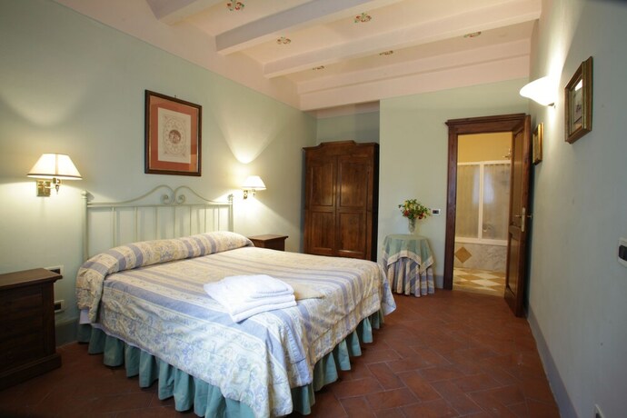 Imagen de la habitación del Fattoria La Gigliola. Foto 17