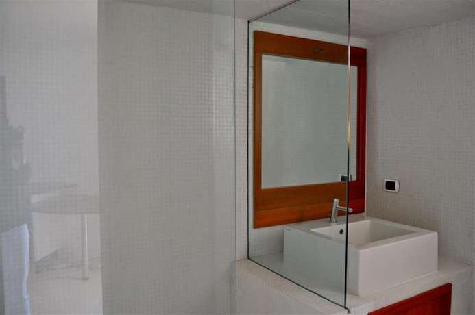 Imagen de la habitación del Favoloso - Argentario Tuscany Stunning Modern Seaside Villa Private Pool Access to Sea. Foto 6