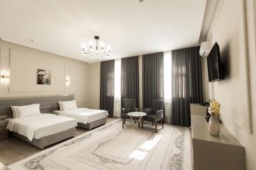 Imagen de la habitación del Fayz Hotel. Foto 17