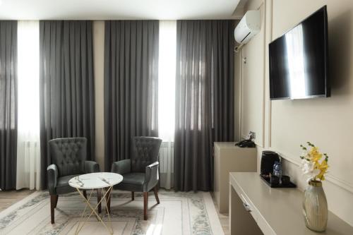 Imagen de la habitación del Fayz Hotel. Foto 18