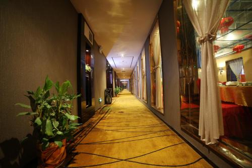 Imagen de la habitación del Feifan Chengpin Hotel Shanmutang. Foto 8