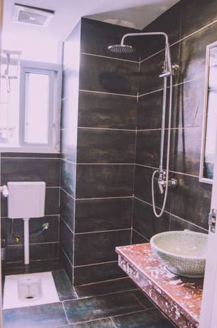 Imagen de la habitación del Fenghuang Ancient City Jiaxing Inn. Foto 2