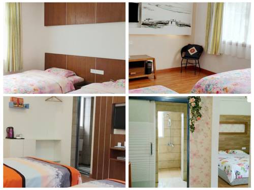 Imagen de la habitación del Fenghuang Ancient City Jiaxing Inn. Foto 3