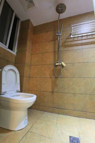 Imagen de la habitación del Fenghuang Ancient City Jiaxing Inn. Foto 4