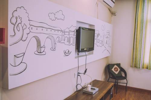 Imagen de la habitación del Fenghuang Ancient City Jiaxing Inn. Foto 6