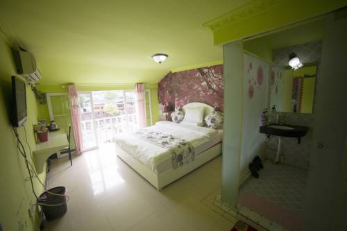 Imagen de la habitación del Fenghuang Jianghu Inn. Foto 4