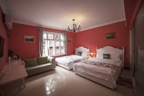 Imagen de la habitación del Fenghuang Jianghu Inn. Foto 5