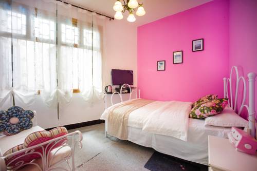 Imagen de la habitación del Fenghuang West Inn. Foto 5