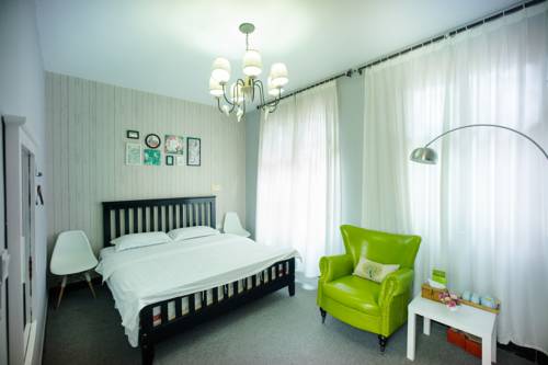 Imagen de la habitación del Fenghuang West Inn. Foto 6