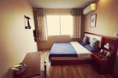 Imagen de la habitación del Fenghuang White House. Foto 6