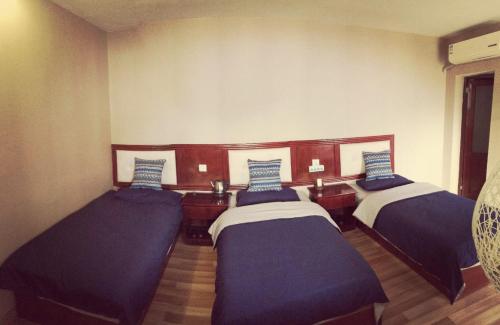 Imagen de la habitación del Fenghuang White House. Foto 8