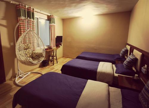 Imagen de la habitación del Fenghuang White House. Foto 9