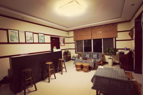 Imagen de la habitación del Fenghuang White House. Foto 10