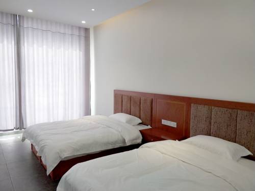 Imagen de la habitación del Fengning Prairie Style Club. Foto 2