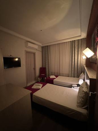 Imagen de la habitación del Ferah Hotel, Araklı. Foto 7