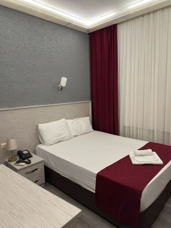 Imagen de la habitación del Ferah Hotel, Araklı. Foto 12