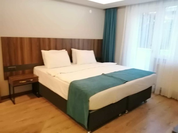 Imagen de la habitación del Ferah Suites Hotel. Foto 10
