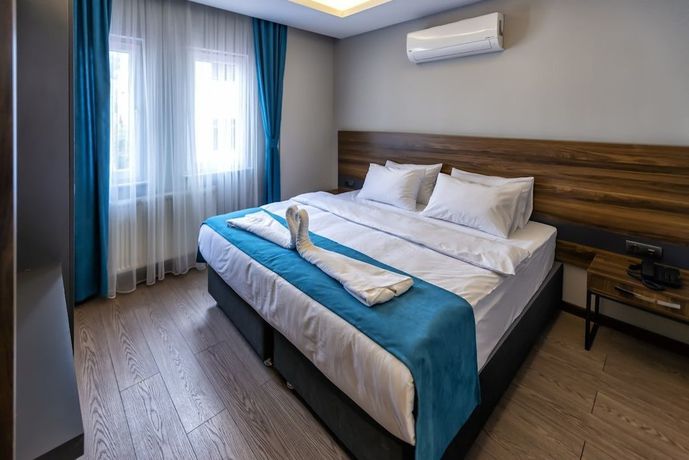 Imagen de la habitación del Ferah Suites Hotel. Foto 12