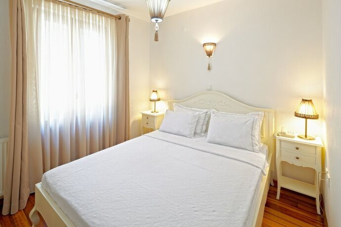 Imagen de la habitación del Ferahi Evler Otel. Foto 11