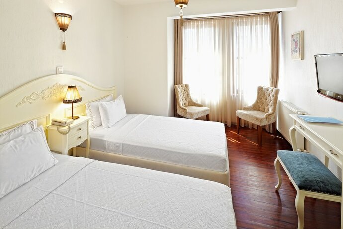 Imagen de la habitación del Ferahi Evler Otel. Foto 15