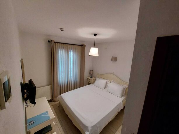 Imagen de la habitación del Ferahi Evler Otel. Foto 16