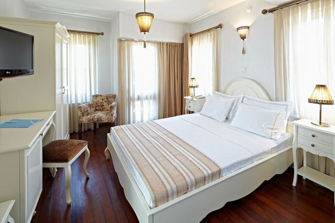 Imagen de la habitación del Ferahi Evler Otel. Foto 18