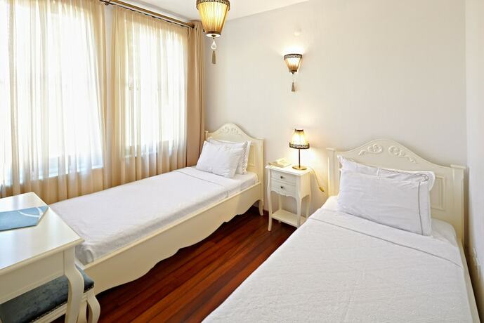 Imagen de la habitación del Ferahi Evler Otel. Foto 20