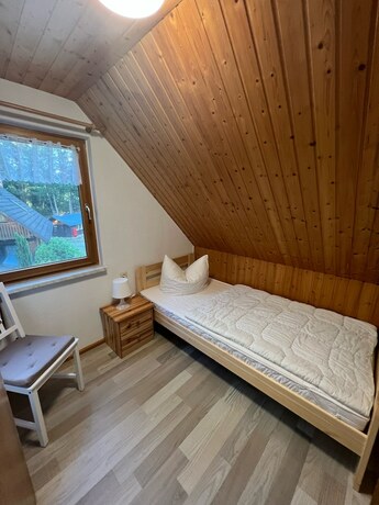 Imagen de la habitación del Feriensiedlung Kiefernhain. Foto 11