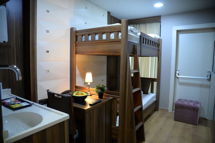 Imagen de la habitación del Ferman Apart Hotel. Foto 14