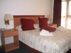 Imagen de la habitación del Fiamingo Apart Hotel. Foto 31