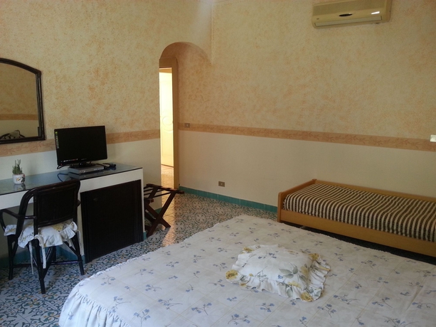 Imagen de la habitación del Fico D'india Relais. Foto 2