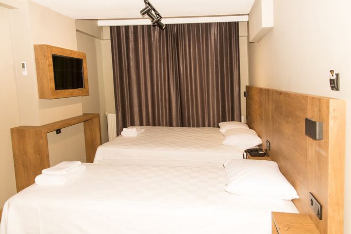 Imagen de la habitación del Fidanoglu Suite Hotel Corlu. Foto 4