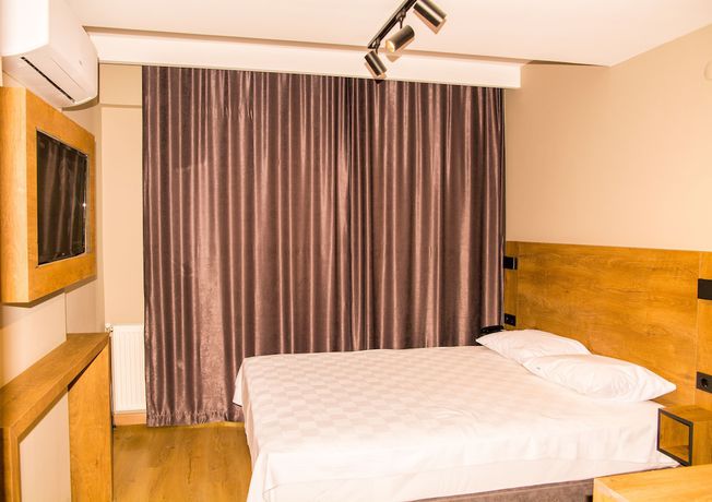 Imagen de la habitación del Fidanoglu Suite Hotel Corlu. Foto 9