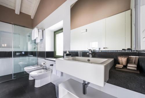 Imagen de la habitación del Firriato Hospitality Cavanera Etnea Resort & Wine. Foto 7